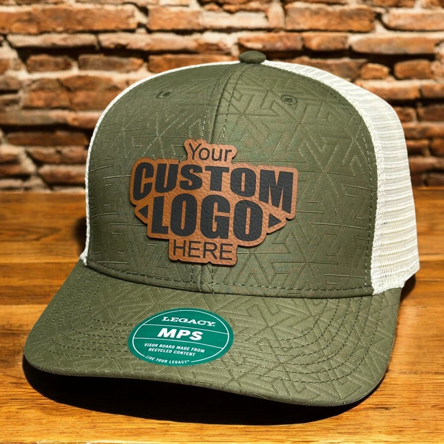 a green trucker hat with a custom logo on it